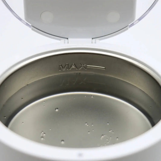 Empty UV Ultra Sonic Denture Cleaner with water inside